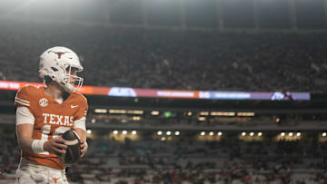 Nov 28, 2025; Austin, Texas, USA; Texas Longhorns quarterback Arch Manning warms up before a game against the Texas A&M Aggies at Darrell K Royal-Texas Memorial Stadium. Mandatory Credit: Scott Wachter-Imagn Images