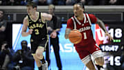Indiana Hoosiers guard Jalen Hood-Schifino (1) dribbles the ball against Purdue Boilermakers guard Braden Smith (3) during the first half at Mackey Arena.