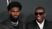 Feb 6, 2025; New Orleans, LA, USA;  Deion Sanders (right) with his son Shedeur Sanders on the red carpet before Super Bowl LIX NFL Honors at Saenger Theatre. Mandatory Credit: Kirby Lee-Imagn Images