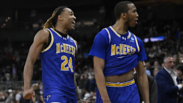 McNeese State Cowboys forward Christian Shumate celebrates with guard Quadir Copeland after defeating the Clemson Tigers at Amica Mutual Pavilion. 