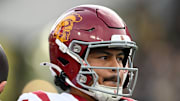 Sep 13, 2025; West Lafayette, Indiana, USA; Southern California Trojans quarterback Jayden Maiava (14) warms up on the sidelines during the first quarter against the Purdue Boilermakers at Ross-Ade Stadium. Mandatory Credit: Marc Lebryk-Imagn Images