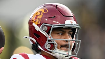Sep 13, 2025; West Lafayette, Indiana, USA; Southern California Trojans quarterback Jayden Maiava (14) warms up on the sidelines during the first quarter against the Purdue Boilermakers at Ross-Ade Stadium. Mandatory Credit: Marc Lebryk-Imagn Images