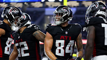 Aug 22, 2025; Arlington, Texas, USA;  Atlanta Falcons tight end Feleipe Franks (84) celebrates with teammates after scoring a touchdown  during the second quarter against the Dallas Cowboys at AT&T Stadium. Mandatory Credit: Kevin Jairaj-Imagn Images