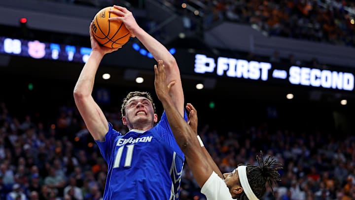 Creighton Bluejays center Ryan Kalkbrenner shoots the ball against Auburn Tigers guard Chad Baker-Mazara. Creighton Bluejays center Ryan Kalkbrenner shoots the ball against Auburn Tigers guard Chad Baker-Mazara.