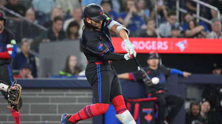 Toronto Blue Jays shortstop Bo Bichette (11) hits a double against the Baltimore Orioles in the sixth inning at Rogers Centre on June 5.