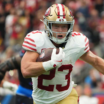 Oct 26, 2025; Houston, Texas, USA; San Francisco 49ers running back Christian McCaffrey (23) runs for a gain during the second half against the Houston Texans at NRG Stadium. Mandatory Credit: Sean Thomas-Imagn Images