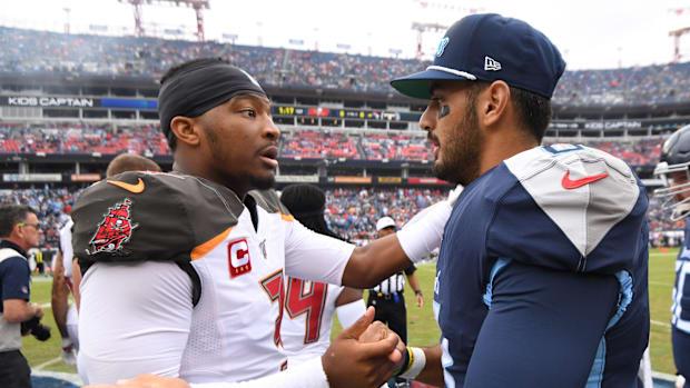 Tampa Bay Buccaneers quarterback Jameis Winston (3) and Tennessee Titans quarterback Marcus Mariota (8) greet each other befo