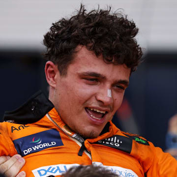 May 5, 2024; Miami Gardens, Florida, USA; McLaren driver Lando Norris (4) celebrates with his team after winning the F1 Miami Grand Prix at Miami International Autodrome. Mandatory Credit: Peter Casey-USA TODAY Sports