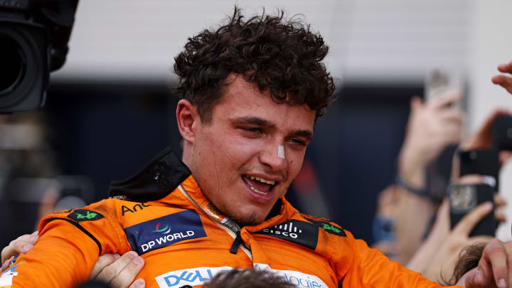 May 5, 2024; Miami Gardens, Florida, USA; McLaren driver Lando Norris (4) celebrates with his team after winning the F1 Miami Grand Prix at Miami International Autodrome. Mandatory Credit: Peter Casey-USA TODAY Sports