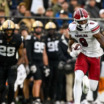 Nov 9, 2024; Nashville, Tennessee, USA;  South Carolina Gamecocks wide receiver Nyck Harbor (8) runs the ball after a made catch against the Vanderbilt Commodores during the first half at FirstBank Stadium. Mandatory Credit: Steve Roberts-Imagn Images