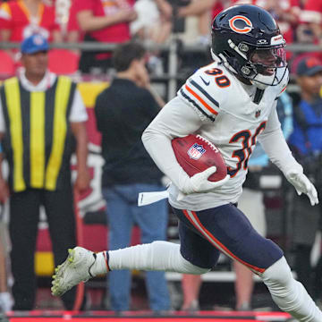 DeAndre Carter, whose jersey has since been changed to 11, makes a cut while returning a preseason punt against Kansas City.