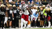 Nov 9, 2024; Nashville, Tennessee, USA;  South Carolina Gamecocks wide receiver Nyck Harbor (8) runs the ball after a made catch against the Vanderbilt Commodores during the first half at FirstBank Stadium. Mandatory Credit: Steve Roberts-Imagn Images