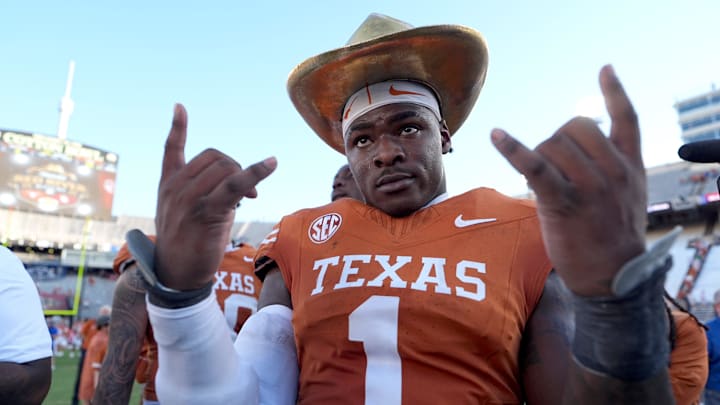 Texas Longhorns defensive end Colin Simmons (1) celebrates with the golden hat following the Red River Rivalry college football game between the University of Oklahoma Sooners and the Texas Longhorn at the Cotton Bowl Stadium in Dallas, Texas, Saturday, Oct. 11, 2025.
