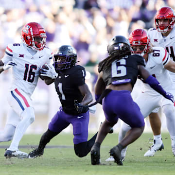 Nov 23, 2024; Fort Worth, Texas, USA; Arizona Wildcats wide receiver Chris Hunter (16) runs the ball against the TCU Horned Frogs in the second quarter at Amon G. Carter Stadium. Mandatory Credit: Tim Heitman-Imagn Images