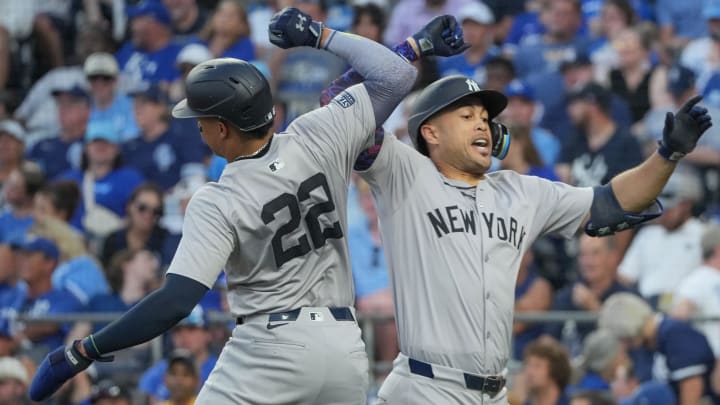 Jun 12, 2024; Kansas City, Missouri, USA; New York Yankees designated hitter Giancarlo Stanton (27) celebrates with right fielder Juan Soto (22) after hitting a two run home run against the Kansas City Royals in the fifth inning at Kauffman Stadium. Mandatory Credit: Denny Medley-USA TODAY Sports