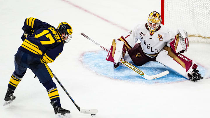 Apr 11, 2024; Saint Paul, Minnesota, USA; Boston College Eagles goaltender Jacob Fowler (1) makes a save on Michigan Wolverines forward Garrett Schifsky (17) in the semifinals of the 2024 Frozen Four college ice hockey tournament during the third period at Xcel Energy Center. Mandatory Credit: Brace Hemmelgarn-Imagn Images