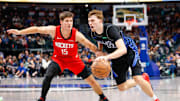 Dec 6, 2025; Dallas, Texas, USA; Dallas Mavericks forward Cooper Flagg (32) is guarded by Houston Rockets guard Reed Sheppard (15) during the fourth quarter at American Airlines Center. Mandatory Credit: Andrew Dieb-Imagn Images