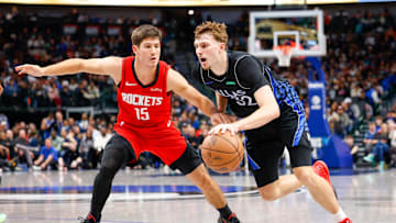 Dec 6, 2025; Dallas, Texas, USA; Dallas Mavericks forward Cooper Flagg (32) is guarded by Houston Rockets guard Reed Sheppard (15) during the fourth quarter at American Airlines Center. Mandatory Credit: Andrew Dieb-Imagn Images