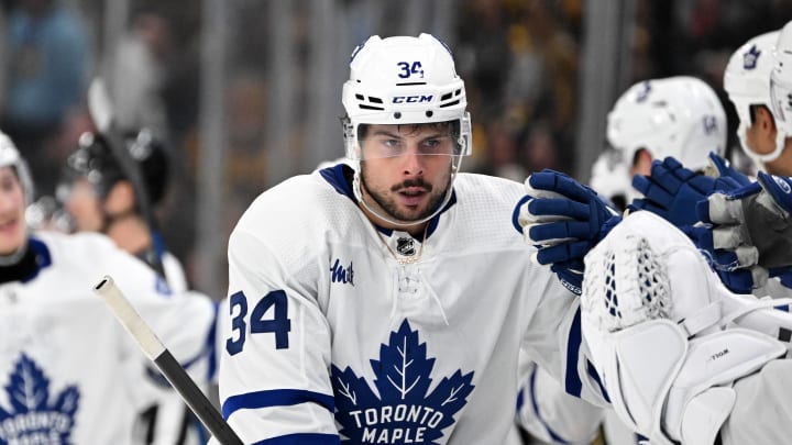 Apr 22, 2024; Boston, Massachusetts, USA; Toronto Maple Leafs center Auston Matthews (34) celebrates with his teammates after scoring a goal against the Boston Bruins during the third period in game two of the first round of the 2024 Stanley Cup Playoffs at TD Garden. Mandatory Credit: Brian Fluharty-USA TODAY Sports