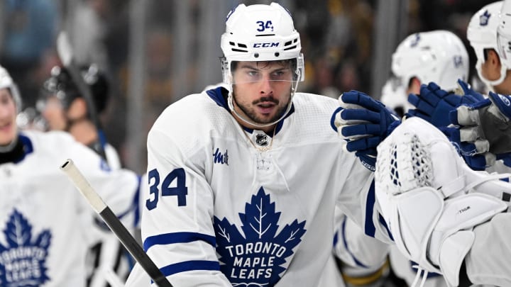 Apr 22, 2024; Boston, Massachusetts, USA; Toronto Maple Leafs center Auston Matthews (34) celebrates with his teammates after scoring a goal against the Boston Bruins during the third period in game two of the first round of the 2024 Stanley Cup Playoffs at TD Garden. Mandatory Credit: Brian Fluharty-USA TODAY Sports