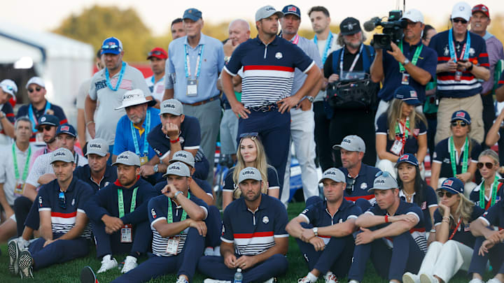 The American contingent could only watch at the 18th hole Saturday afternoon as a disastrous day ended. 