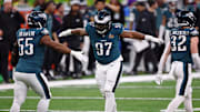 Feb 9, 2025; New Orleans, LA, USA; Philadelphia Eagles defensive tackle Moro Ojomo (97) celebrates with defensive end Brandon Graham (55) after a play against the Kansas City Chiefs during the first half of Super Bowl LIX at Caesars Superdome. Mandatory Credit: Bill Streicher-Imagn Images