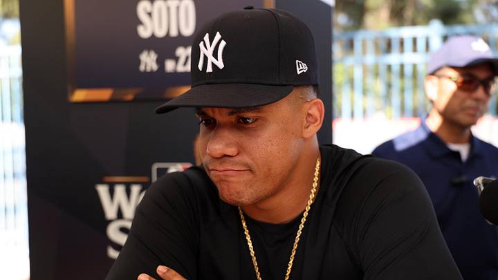 Oct 24, 2024; Los Angeles, CA, USA;  New York Yankees outfielder Juan Soto (22) speaks to media during workout day at Dodgers Stadium. Mandatory Credit: Kiyoshi Mio-Imagn Images