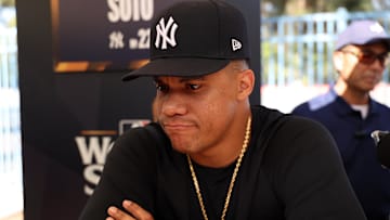 Oct 24, 2024; Los Angeles, CA, USA;  New York Yankees outfielder Juan Soto (22) speaks to media during workout day at Dodgers Stadium. Mandatory Credit: Kiyoshi Mio-Imagn Images