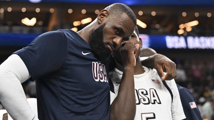 Jul 10, 2024; Las Vegas, Nevada, USA; USA forward Lebron James (6) and guard Anthony Edwards (5) speak on the bench in the fourth quarter against Canada in the USA Basketball Showcase at T-Mobile Arena. Mandatory Credit: Candice Ward-USA TODAY Sports