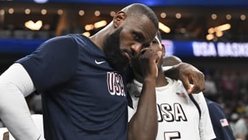 Jul 10, 2024; Las Vegas, Nevada, USA; USA forward Lebron James (6) and guard Anthony Edwards (5) speak on the bench in the fourth quarter against Canada in the USA Basketball Showcase at T-Mobile Arena. Mandatory Credit: Candice Ward-USA TODAY Sports