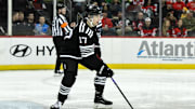 Apr 7, 2024; Newark, New Jersey, USA; New Jersey Devils defenseman Simon Nemec (17) skates with the puck during the third period against the Nashville Predators at Prudential Center. Mandatory Credit: John Jones-USA TODAY Sports