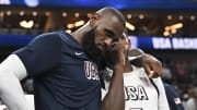 Jul 10, 2024; Las Vegas, Nevada, USA; USA forward Lebron James (6) and guard Anthony Edwards (5) speak on the bench in the fourth quarter against Canada in the USA Basketball Showcase at T-Mobile Arena. Mandatory Credit: Candice Ward-USA TODAY Sports