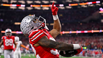 Jan 10, 2025; Arlington, TX, USA; Ohio State Buckeyes running back TreVeyon Henderson (32) celebrates during the game between the Texas Longhorns and the Ohio State Buckeyes at AT&T Stadium. Mandatory Credit: Jerome Miron-Imagn Images