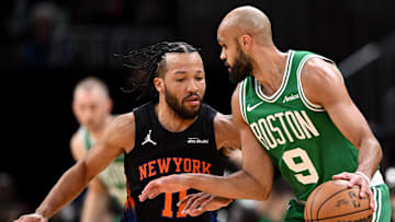 Dec 2, 2025; Boston, Massachusetts, USA; New York Knicks guard Jalen Brunson (11) defends Boston Celtics guard Derrick White (9) during the first half at the TD Garden. Mandatory Credit: Brian Fluharty-Imagn Images