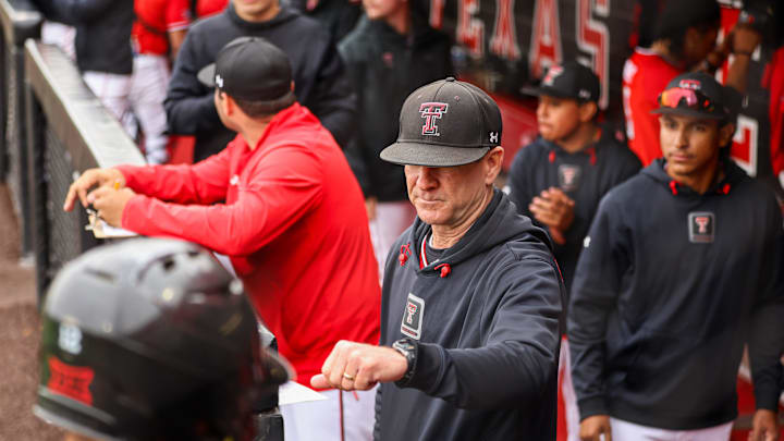 Texas Tech baseball head coach Tim Tadlock gives a Red Raider a fist bump after scoring a run against Oklahoma faces Oklahoma in game two of their Big 12 conference baseball series, Saturday, May 4, 2024, at Rip Griffin Park.