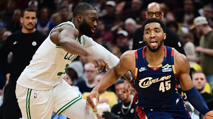 Cleveland Cavaliers guard Donovan Mitchell (45) drives to the basket against Boston Celtics guard Jaylen Brown (7)