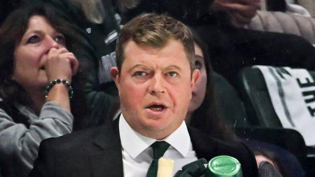 Michigan State's head coach Adam Nightingale, center, looks on from the bench during the first period in the game against New Hampshire on Thursday, Oct. 9, 2025, at Munn Ice Arena in East Lansing.