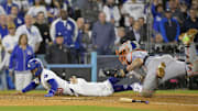 Oct 20, 2024; Los Angeles, California, USA; Los Angeles Dodgers outfielder Mookie Betts (50) is out at home against New York Mets catcher Francisco Alvarez (4) in the eighth inning during game six of the NLCS for the 2024 MLB playoffs at Dodger Stadium. 