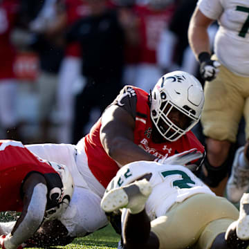 South Florida Bulls running back K'Wan Powell (22) recovers a fumble as Cincinnati Bearcats defensive lineman Dominique Perry (96) and Cincinnati Bearcats linebacker Jaheim Thomas (7) attempt to recover it in the fourth quarter of the NCAA Football game at Nippert Stadium in Cincinnati on Saturday, Oct. 8, 2022. Cincinnati Bearcats defeated South Florida Bulls 28-24.

South Florida Bulls At Cincinnati Bearcats 558