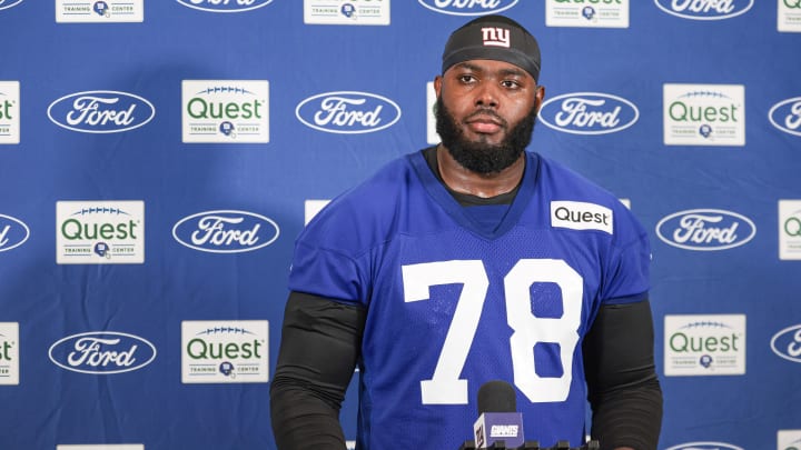 Jul 24, 2024; East Rutherford, NJ, USA; New York Giants offensive tackle Andrew Thomas (78) talks with media during training camp at Quest Diagnostics Training Facility.  