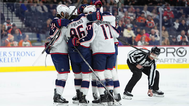 Mar 14, 2026; Philadelphia, Pennsylvania, USA; Columbus Blue Jackets right wing Kirill Marchenko (86) celebrates with teammates after scoring a goal against the Philadelphia Flyers in the first period at Xfinity Mobile Arena. Mandatory Credit: Kyle Ross-Imagn Images