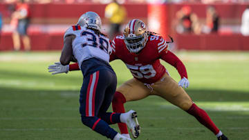 Sep 29, 2024; Santa Clara, California, USA; San Francisco 49ers linebacker De'Vondre Campbell (59) tackles New England Patriots running back Rhamondre Stevenson (38) during the fourth quarter at Levi's Stadium. Mandatory Credit: Neville E. Guard-Imagn Images