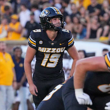 Aug 29, 2024; Columbia, Missouri, USA; Missouri Tigers place kicker Blake Craig (19) prepares to kick the point after touchdown against the Murray State Racers during the game at Faurot Field at Memorial Stadium. Mandatory Credit: Denny Medley-Imagn Images