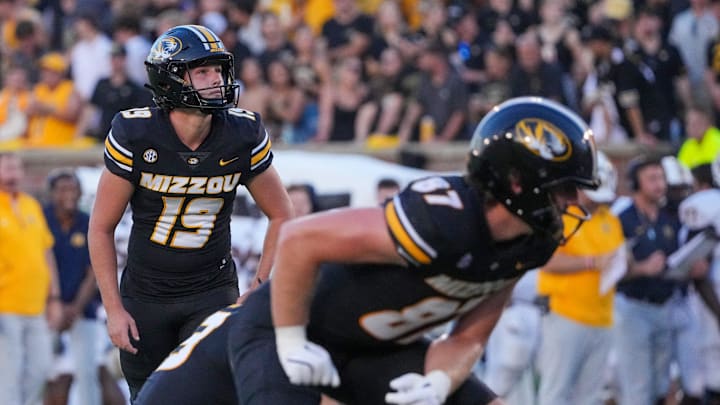 Aug 29, 2024; Columbia, Missouri, USA; Missouri Tigers place kicker Blake Craig (19) prepares to kick the point after touchdown against the Murray State Racers during the game at Faurot Field at Memorial Stadium. Mandatory Credit: Denny Medley-Imagn Images