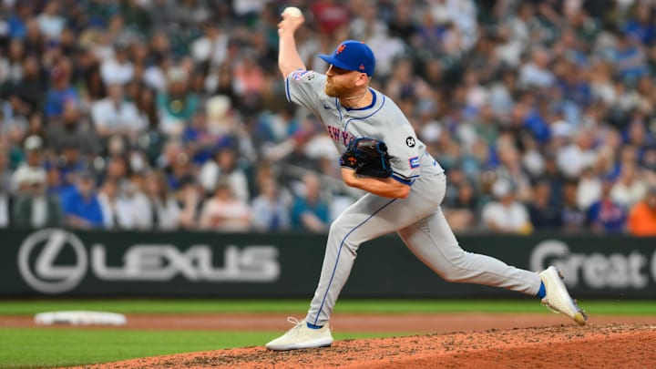 Aug 10, 2024; Seattle, Washington, USA; New York Mets relief pitcher Reed Garrett (75) pitches to the Seattle Mariners during the sixth inning at T-Mobile Park. Mandatory Credit: Steven Bisig-Imagn Images