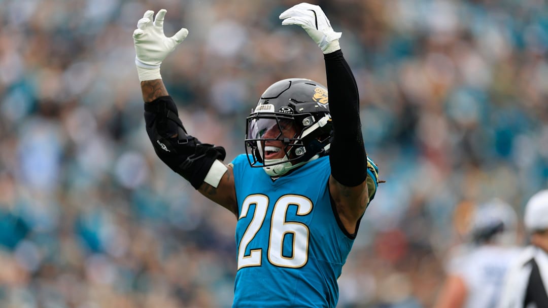 Jacksonville Jaguars safety Antonio Johnson (26) reacts to his tackle during the first quarter of an NFL football matchup at EverBank Stadium, Sunday, Jan. 4, 2026, in Jacksonville, Fla. The Jaguars defeated the Titans 41-7, capturing the AFC South title. [Corey Perrine/Florida Times-Union]