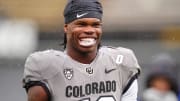 Apr 27, 2024; Boulder, CO, USA; Colorado Buffaloes cornerback Travis Hunter (12) warms up before a spring game event at Folsom Field. Mandatory Credit: Ron Chenoy-USA TODAY Sports
