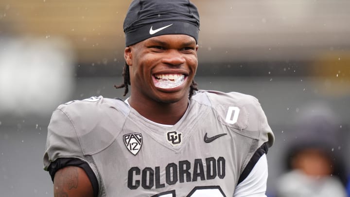 Apr 27, 2024; Boulder, CO, USA; Colorado Buffaloes cornerback Travis Hunter (12) warms up before a spring game event at Folsom Field. Mandatory Credit: Ron Chenoy-USA TODAY Sports