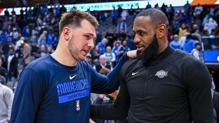 Dec 25, 2022; Dallas, Texas, USA; Dallas Mavericks guard Luka Doncic (left) talks with Los Angeles Lakers forward LeBron James (right) after the Mavericks defeat the Lakers at the American Airlines Center. Mandatory Credit: Jerome Miron-USA TODAY Sports