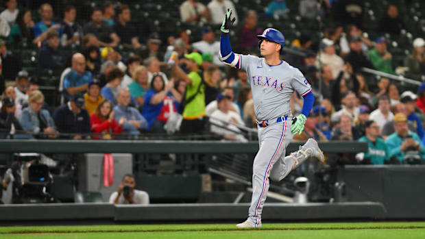 Texas Rangers first baseman Nathaniel Lowe has five hits in the first two games against the Seattle Mariners this weekend.